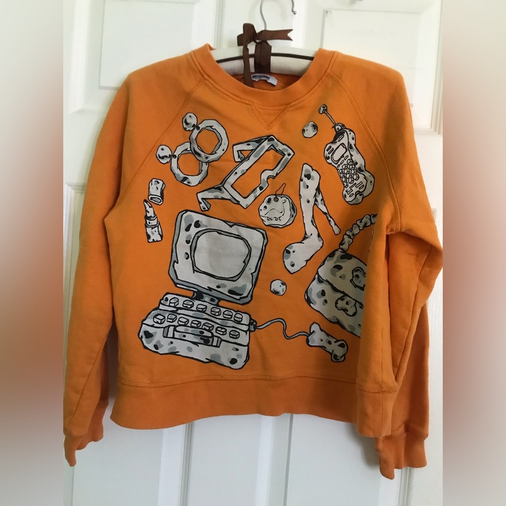 Moschino （cheap-&chic） women orange sweatshirt size 4.